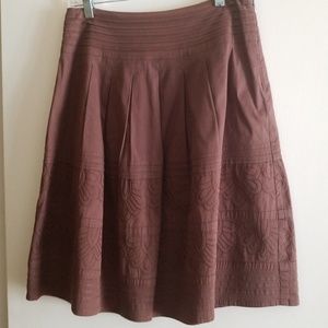Cutest brown sassy skirt.